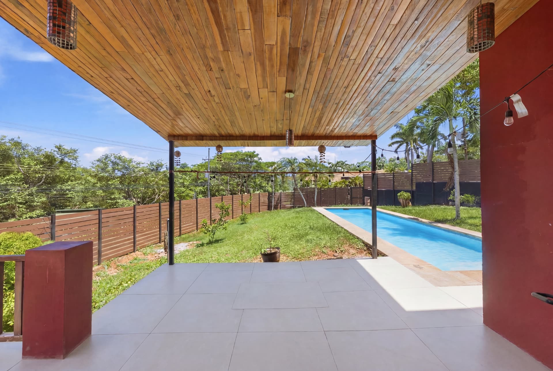 Covered terrace overlooking the pool