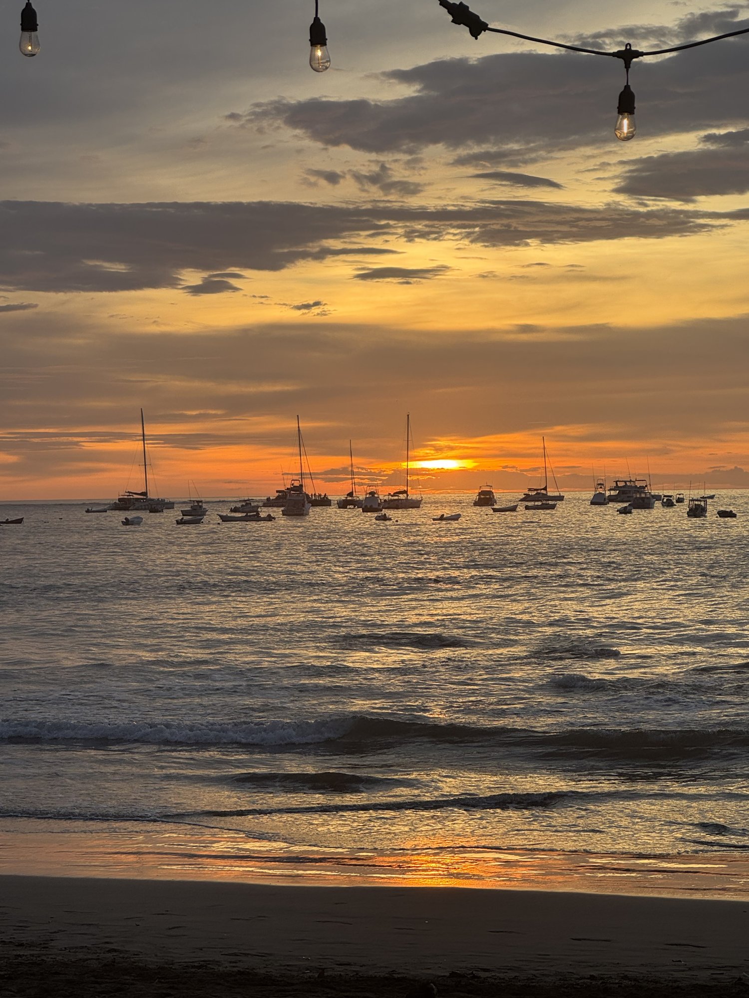 Sailboats in Tamarindo bay at sunset